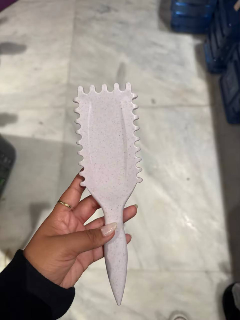 Smooth, defined curly hair after using the Eco-Flex brush.