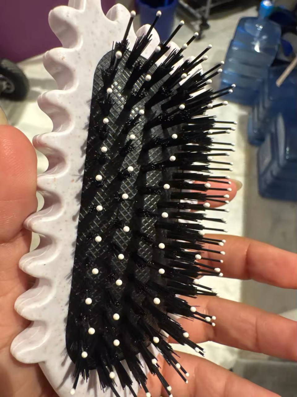 Close-up of the detangling brush's flexible bristles.